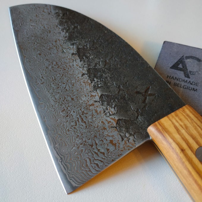 damascus Serbian chef's knife and mini Belgian Blue coticule whetstone